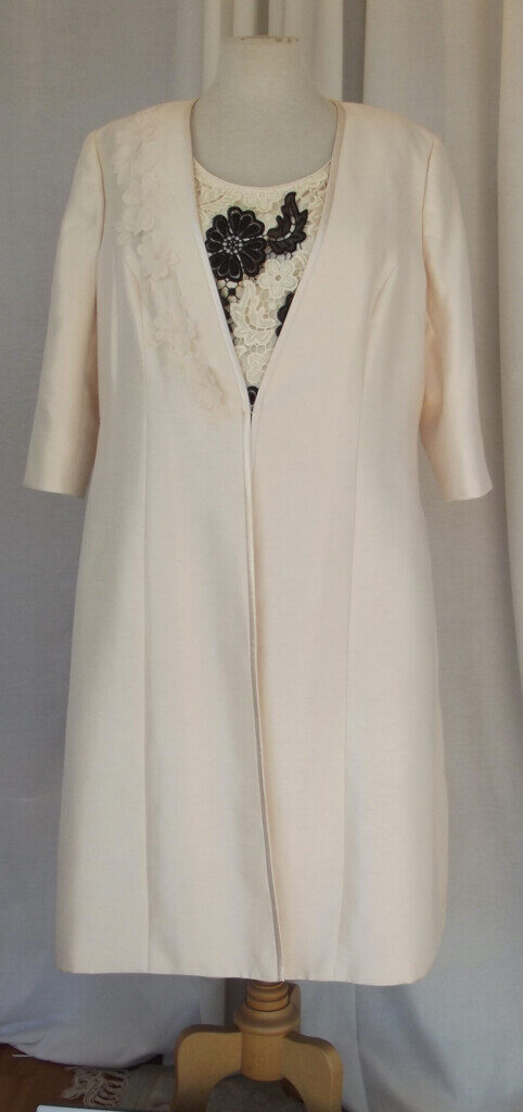 IVORY SHANTUNG COAT WITH IVORY  & BLACK FLOWERHEAD LACE SHIFT DRESS.
